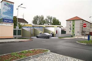 Vizualizace odhalující budoucí možné umístění samoobslužné myčky automobilů v bezprostřední blízkosti nového parkoviště na Husově ulici.
REPRO: SLUMEKO
